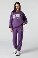 Jogger en molleton avec motif brodé destination