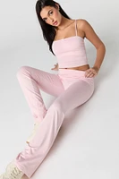 Pantalon profilé à jambe évasée avec taille pliée