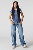 Jean rigide baggy d'aspect usé à taille basse avec poches