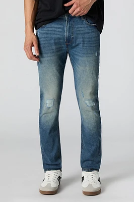 Jean mince extensible à effet d'usure lavé fonc