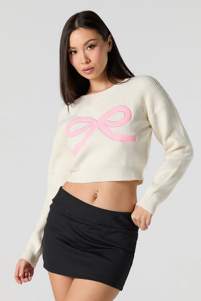 Chandail court en tricot côtelé avec motif brod