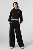 Pantalon en molleton uni à jambe large