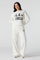 Pantalon d'entraînement à jambe large en molleton imprim