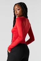 Maillot profilé ruché à manches longues avec encolure en V