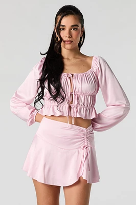 Minijupe en satin à taille coulissante