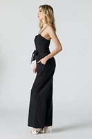 Combinaison jambe large avec ceinture et devant boutonn