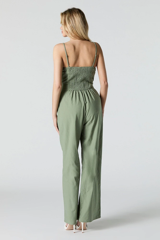 Combinaison jambe large avec ceinture et devant boutonn