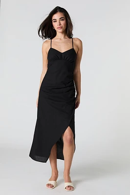 Robe midi en mélange de lin avec brides et fente