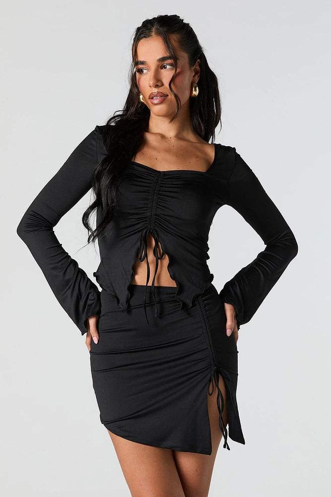 Minijupe asymétrique à taille coulissante