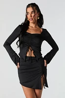 Minijupe asymétrique à taille coulissante
