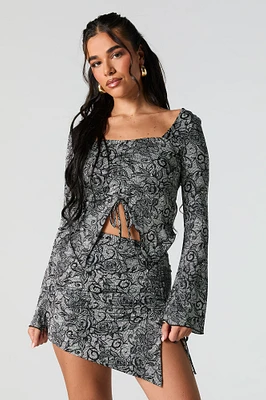 Minijupe asymétrique à taille coulissante