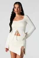 Minijupe asymétrique à taille coulissante