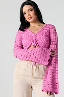 Haut crocheté court à manches longues avec taille coulissante
