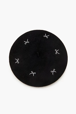 Bérêt avec motif brodé Bow