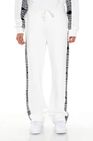 Jogger en tissu bouclette avec motif abstrait