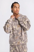 Haut à capuchon motif camouflage arboré homme