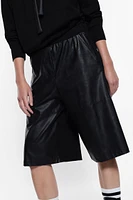 Knee-length shorts faux leather and fabric