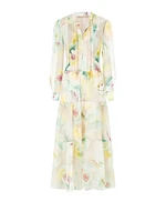 Robe longue à volants en georgette avec col V et chaînes sur le