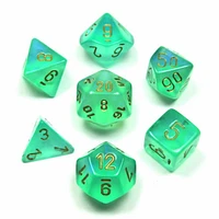 7 dés polyédriques Borealis Luminary - Vert pâle avec chiffres dorés