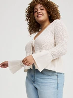 POINTELLE RUFFLE HEM TIE FRONT CARDIGAN