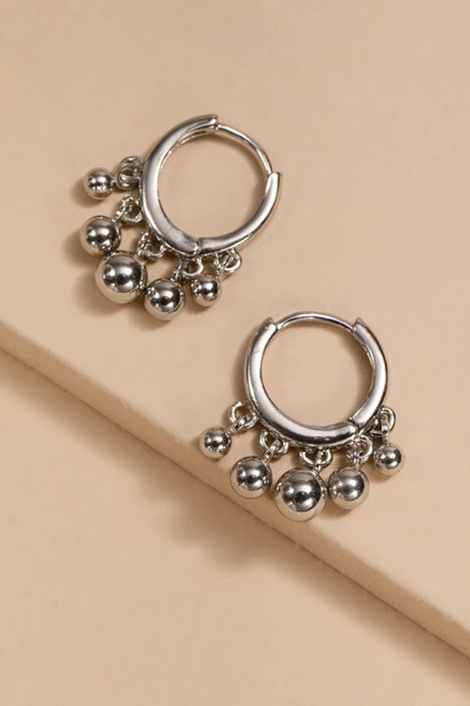 Monique Shaky Ball Charm On Huggie Earrings