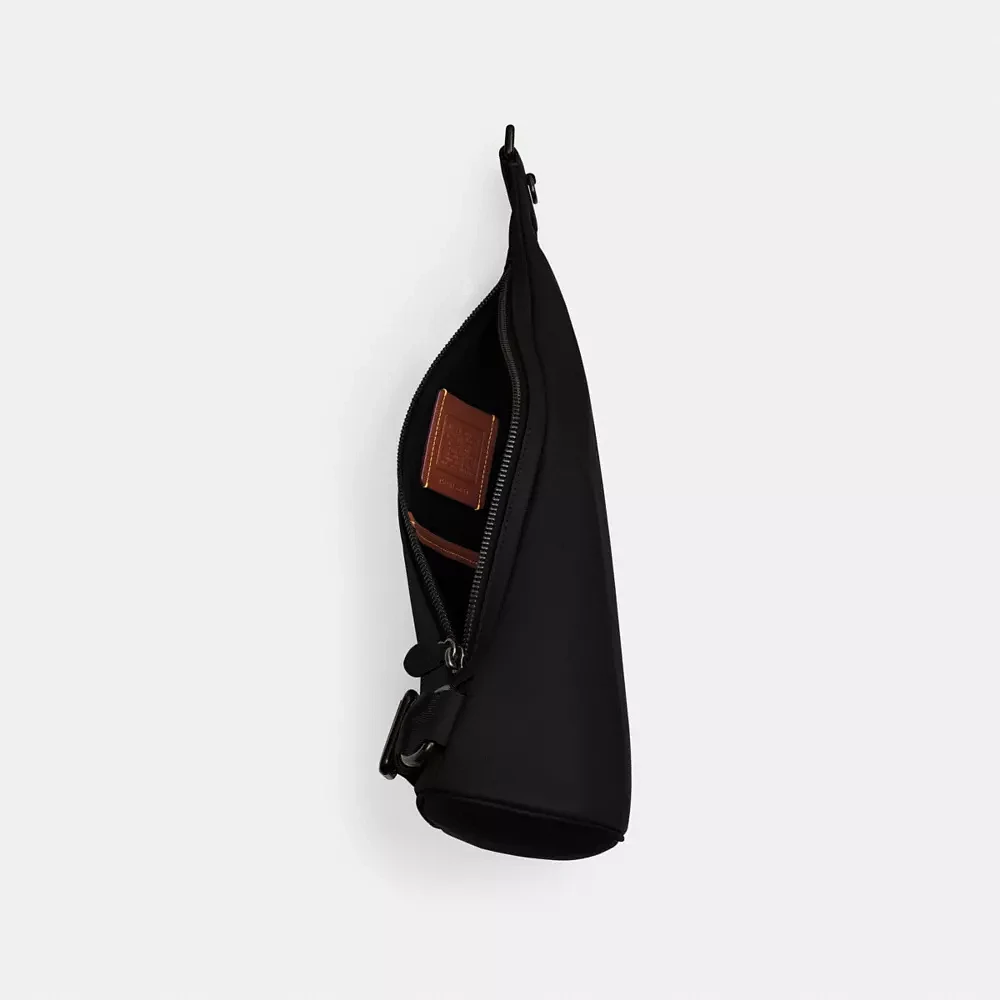 Triangle Sling Bag Signature Canvas