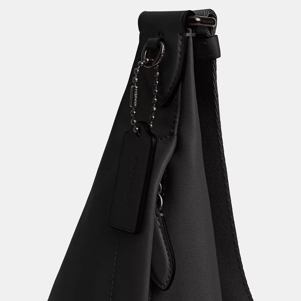 Triangle Sling Bag Signature Canvas