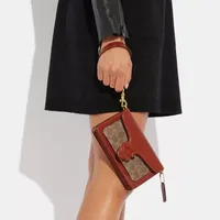 Tabby Crossbody Wristlet In Signature Canvas