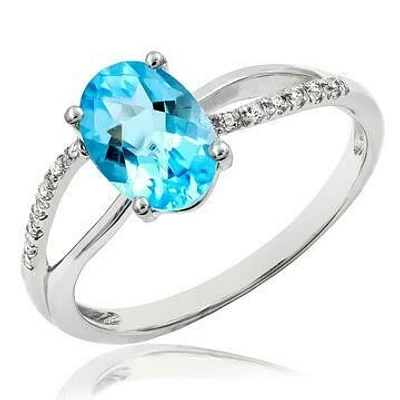 Oval Blue Topaz Ring with Diamond Accent and Split Shoulders 14KT Gold