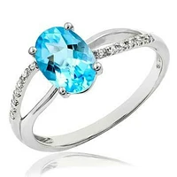 Oval Blue Topaz Ring with Diamond Accent and Split Shoulders 14KT Gold