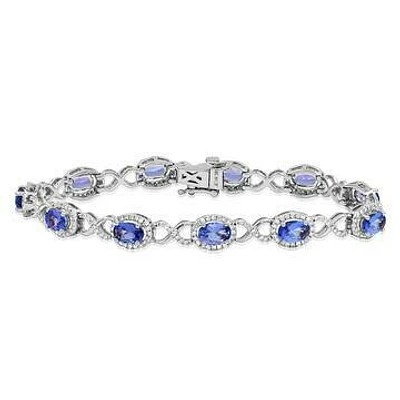 Open Gold Tanzanite Bangle with Diamond Cluster White Gold