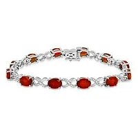 Oval Ruby Twist Bracelet with Diamond Accent White Gold