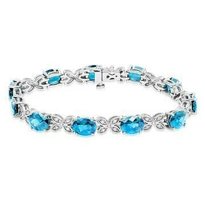 Oval Blue Topaz Butterfly Bracelet with White Sapphires