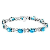 Oval Blue Topaz Butterfly Bracelet with White Sapphires