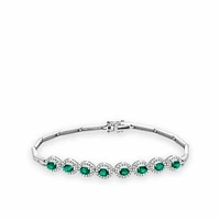 Oval Emerald & Diamond Halo Bracelet 0.51CTDI White Gold