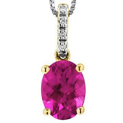 Oval Topaz Pendant with Diamond Bail 14KT Gold