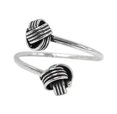 Sterling Silver, Adjustable Love Knot Ring. Approximate Knot Size: 7mm Diameter