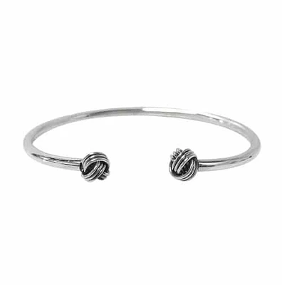 Sterling Silver Cuff Bangle With 7mm Love Knot Charm. Approximate Bar Size: 3mm Thickness