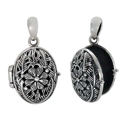 Sterling Silver, Detail Oval Shape Locket With Filigree Design. Approx Size: 20mm L X 15mm W X 10mm T