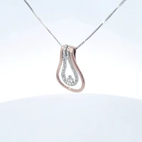 10K Two Tone Rose and White Gold 0.20cttw Diamond Pendant, 18"