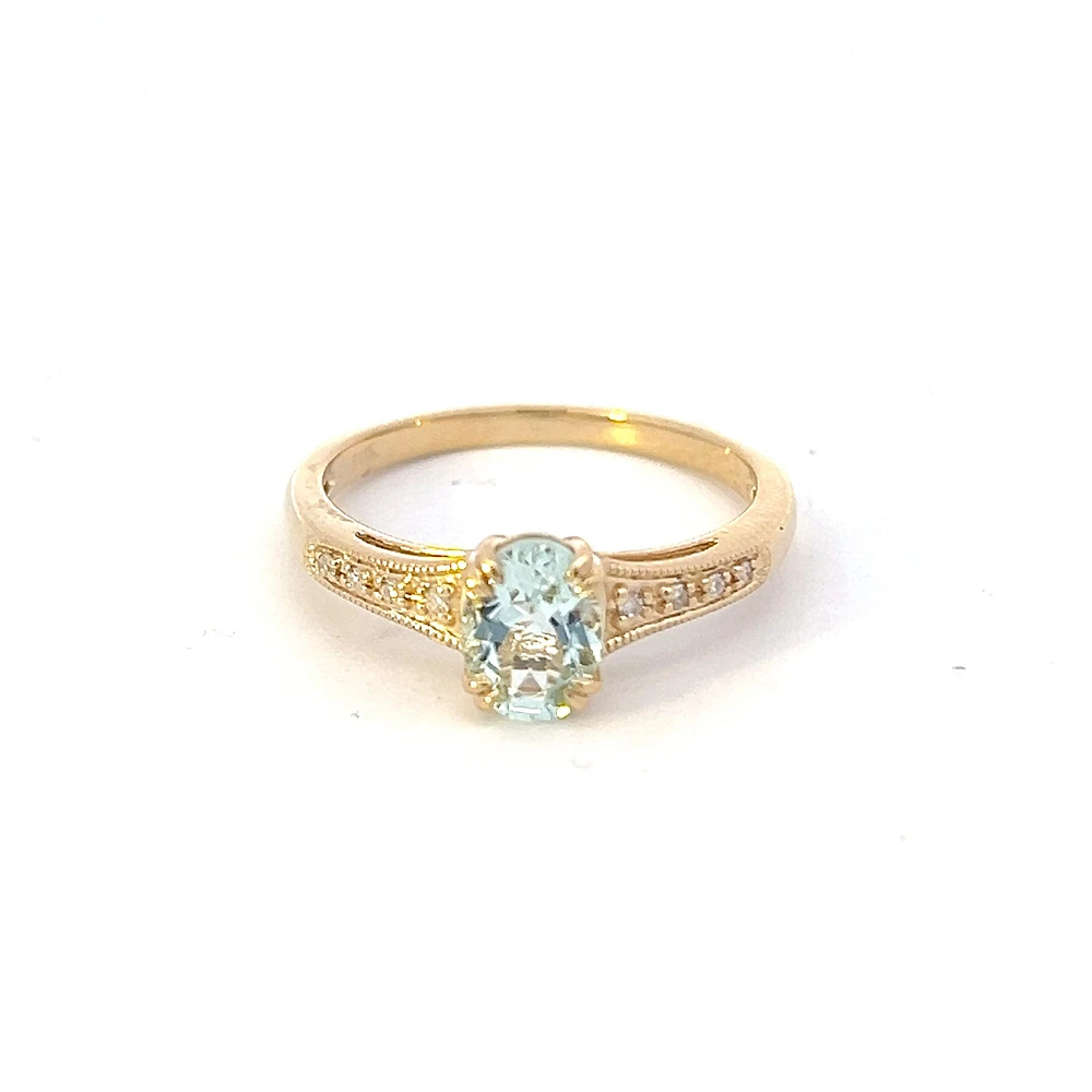 10K Yellow Gold 0.65cttw Aquamarine and 0.04cttw Diamond Ring, size 7