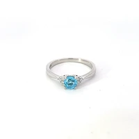 10K White Gold Blue Topaz and 0.06cttw Diamond Ring - 6