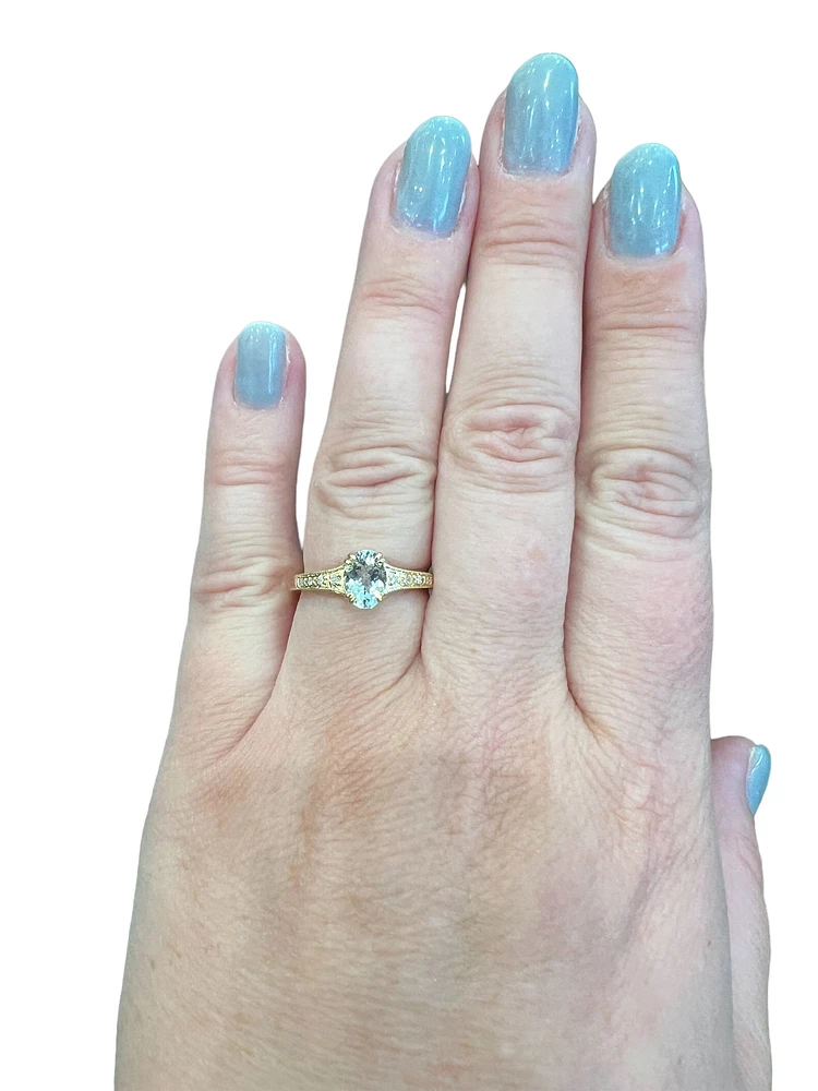 10K Yellow Gold 0.65cttw Aquamarine and 0.04cttw Diamond Ring, size 7