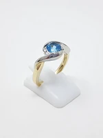 Blue Topaz and Diamond Ring