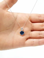 Blue Topaz and Diamond Pendant
