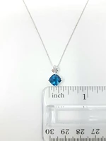 Blue Topaz and Diamond Pendant