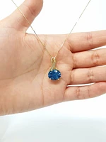 Blue Topaz and Diamond Pendant