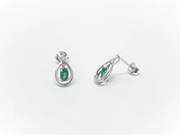 10K White Gold Oval Cut Emerald Stud Earrings