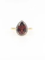 10K Yellow Gold 10 x 7mm Pear Shaped Garnet and 0.135cttw Diamond Ring