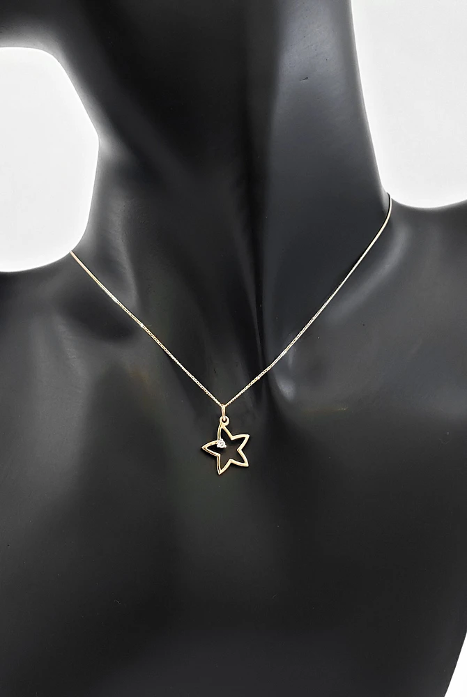 10K Yellow Gold 0.02cttw Diamond Star Pendant, 18"